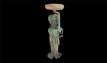 View an interactive 3-D model of a bronze sword-bearer lamp.